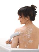 Eponge avec long manche pour le corps